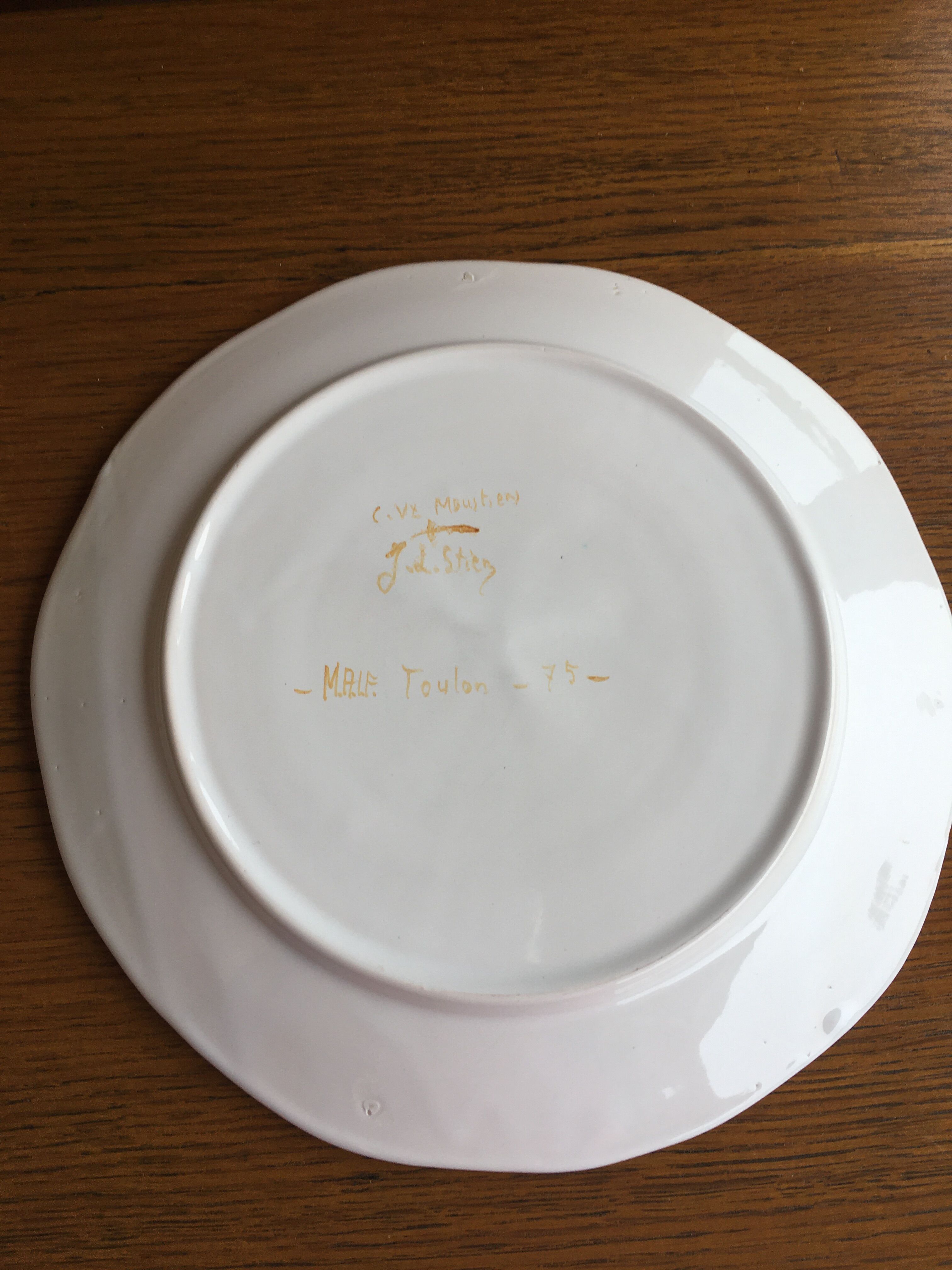 Moustiers plate signed bird decor