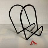 Pair of black metal bookends A