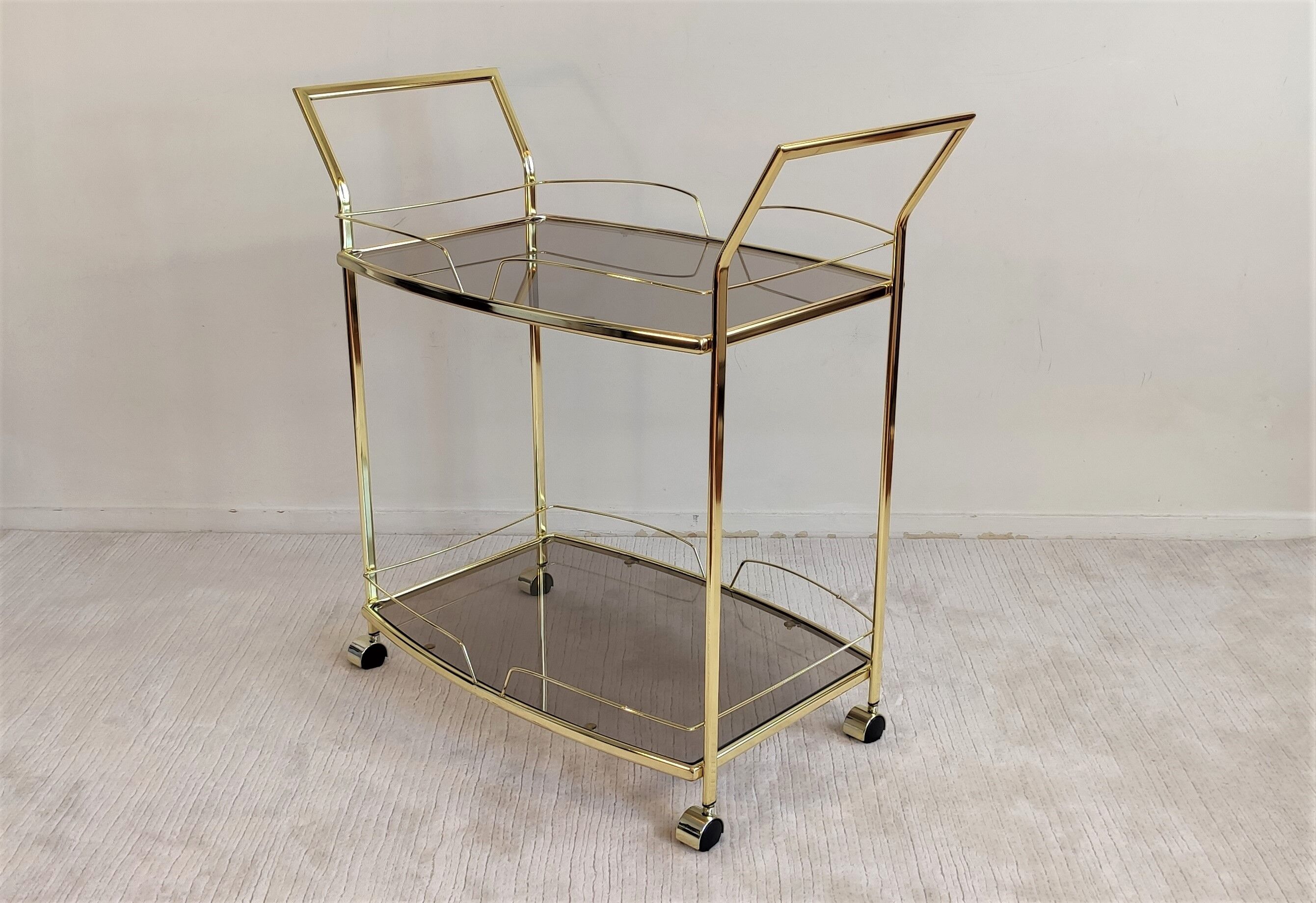 Serves golden trolley bar with wheels, in golden brass of the 80'S