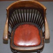 Antique English Edwardian captain's chair in oak by Ralph Johnson.
