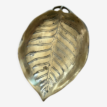 Old brass pocket vacuum, leaf.