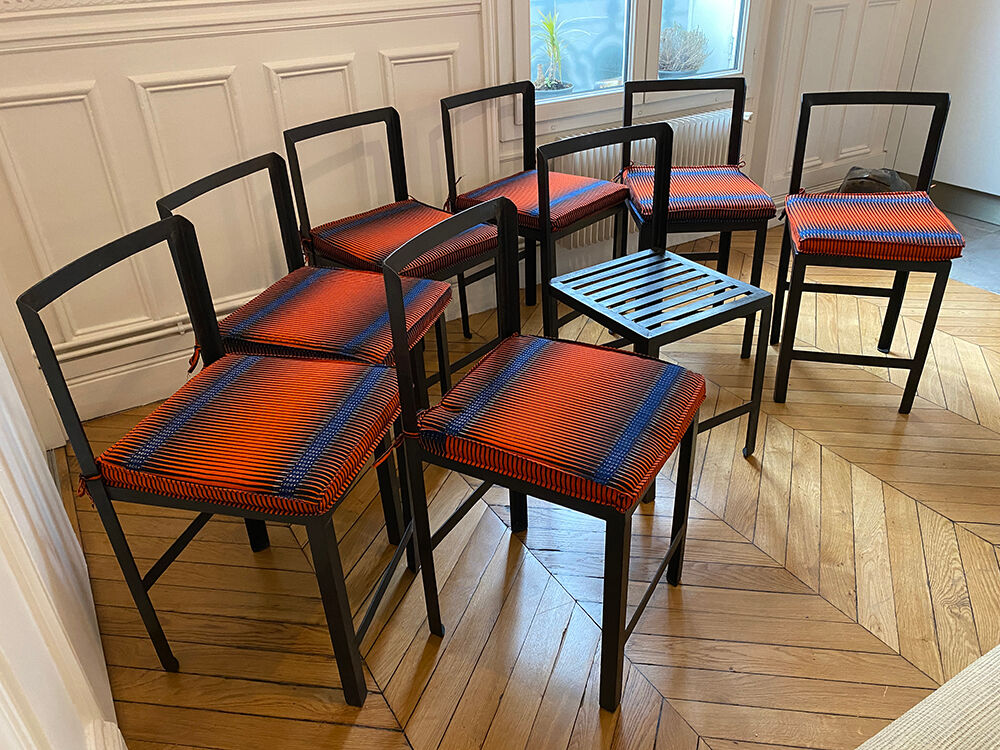Set of 8 patinated and waxed raw steel chairs