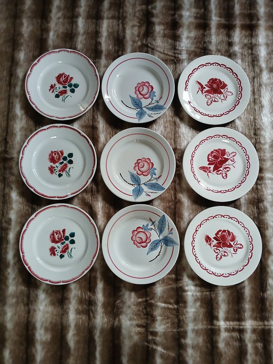 9 mismatched antique dinner plates