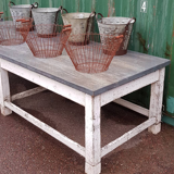 Wooden table with zinc top