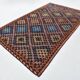 Tapis Kilim tribal bleu et bordeaux