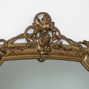 Miroir en bois doré de style néo-classique à motif corde et pompons