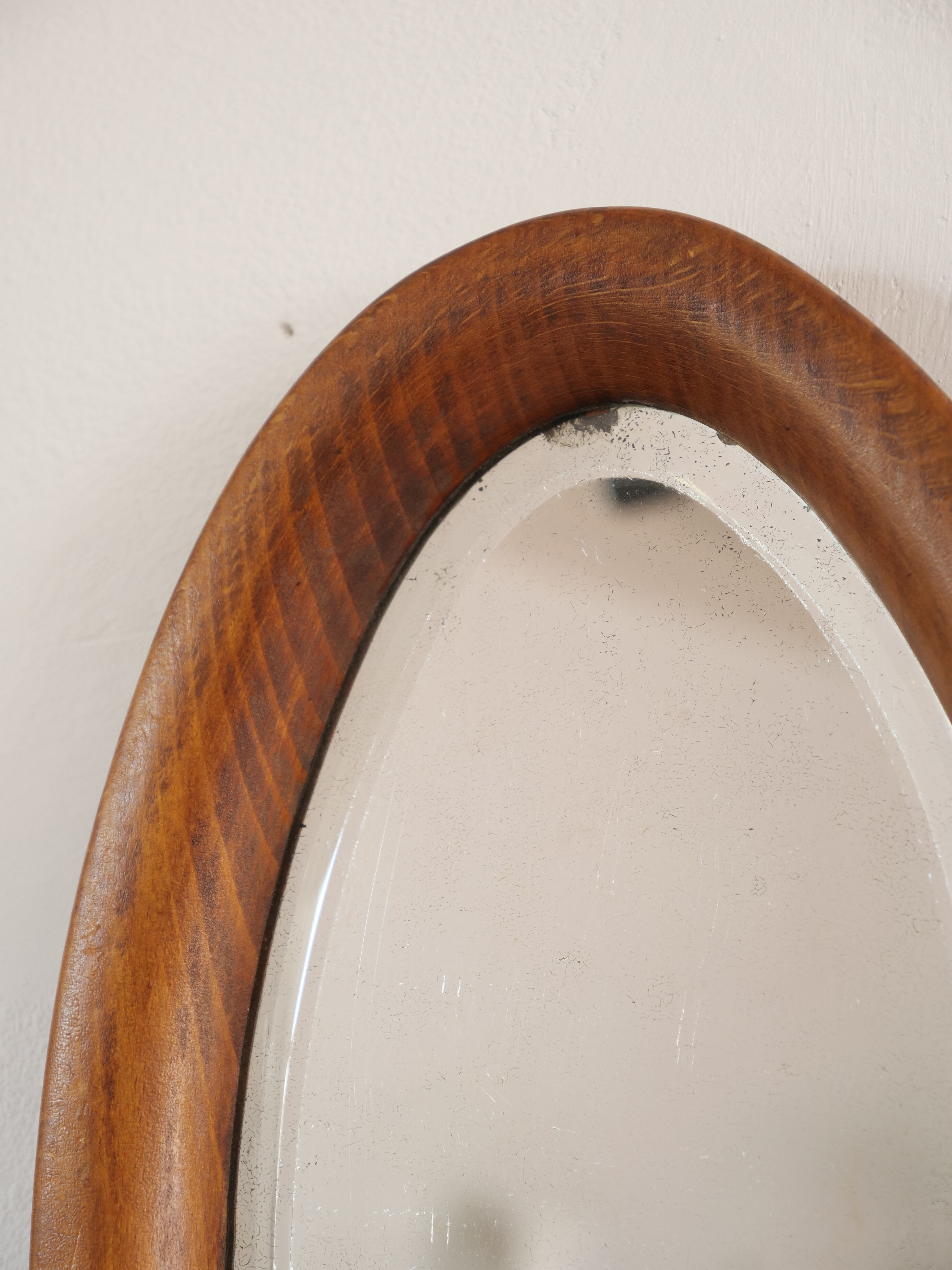 Oval mirror in artisan wood 28x49cm