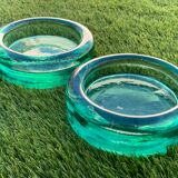 Pair of ashtrays or empty round glass pockets