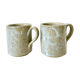 Pair of enamelled stoneware mugs