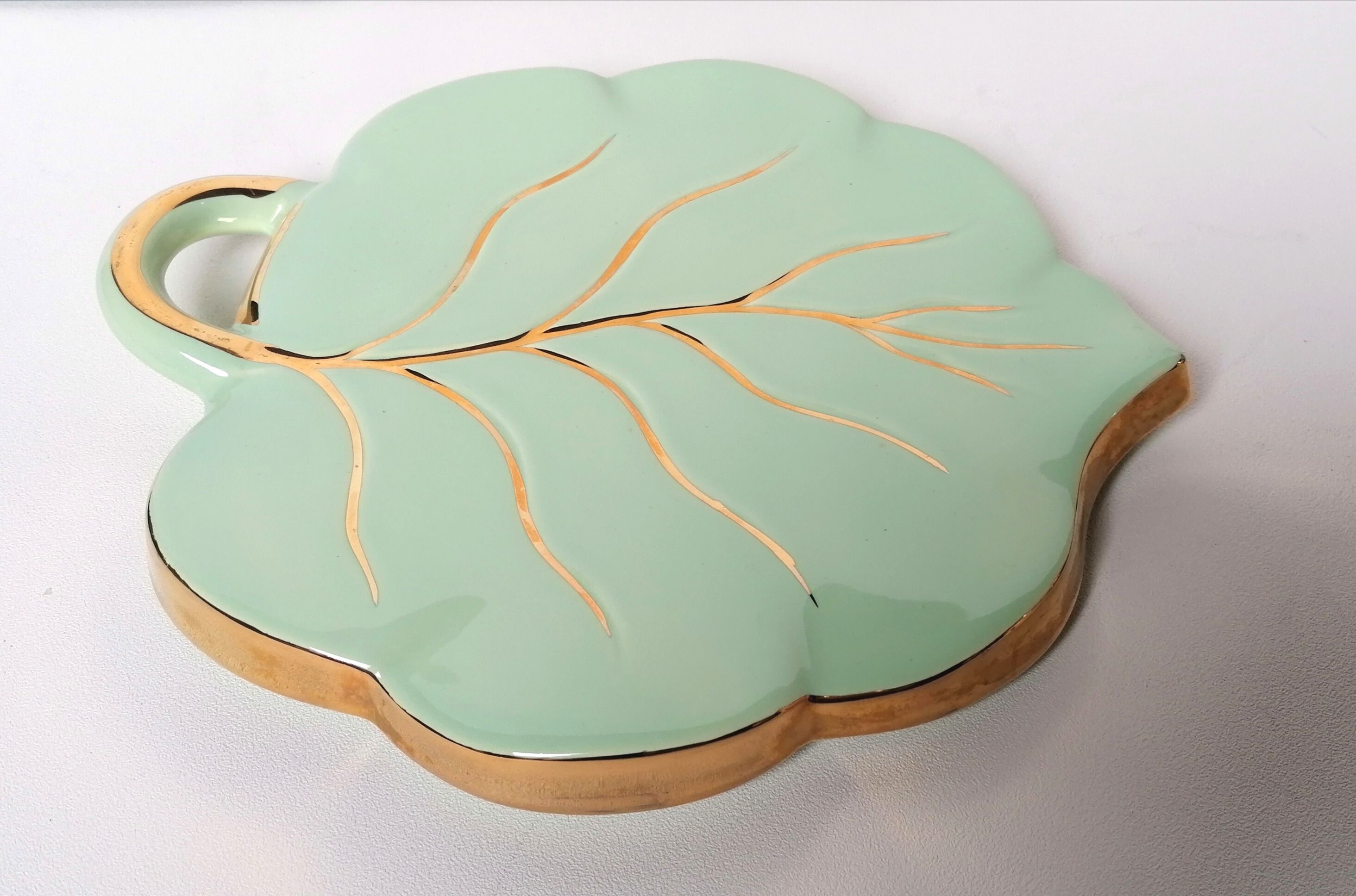 Celadon green leaf trivety and gilding