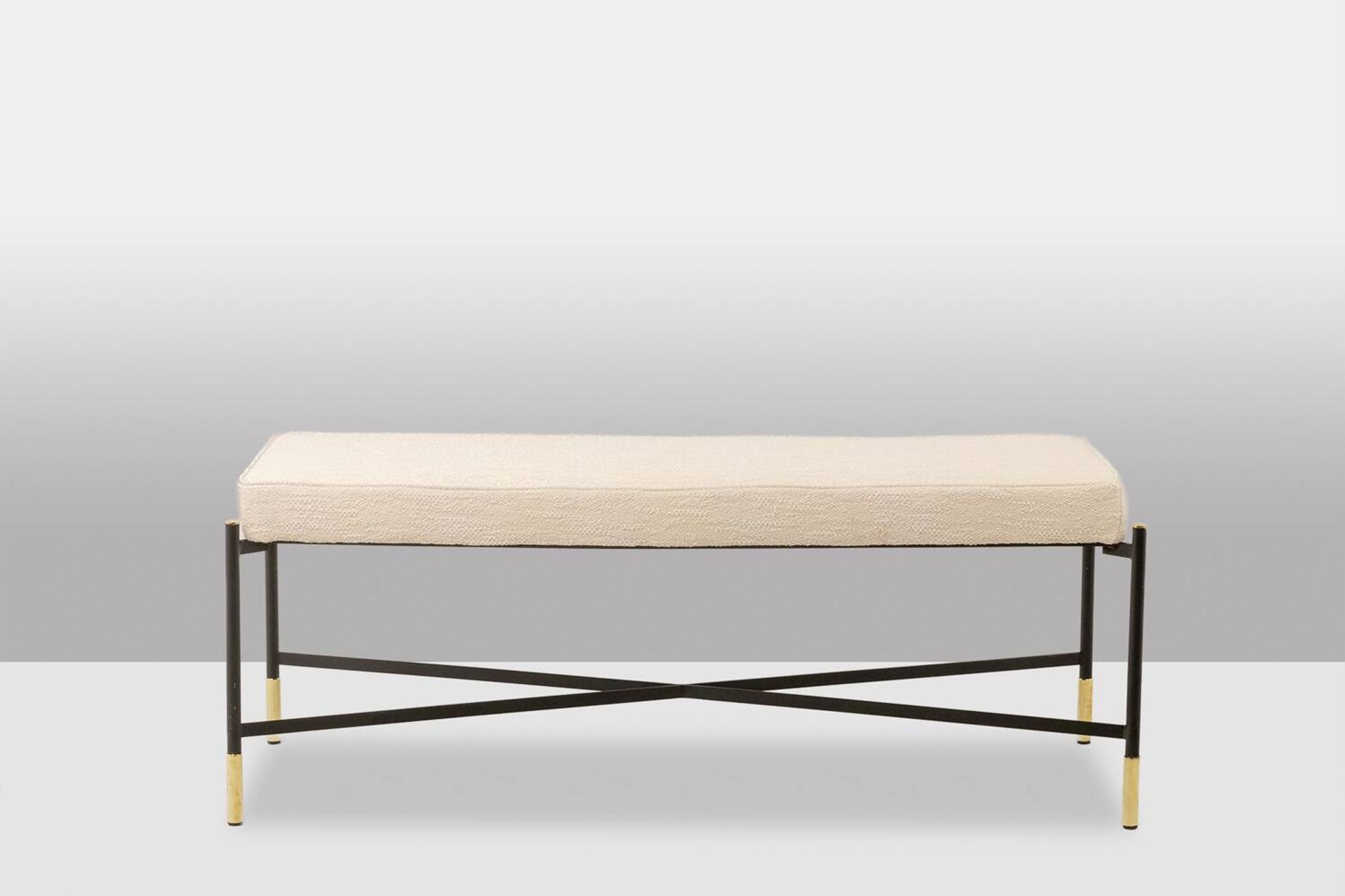 Pair of white benches, in lacquered and gilded metal. 2000s.