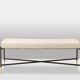 Pair of white benches, in lacquered and gilded metal. 2000s.