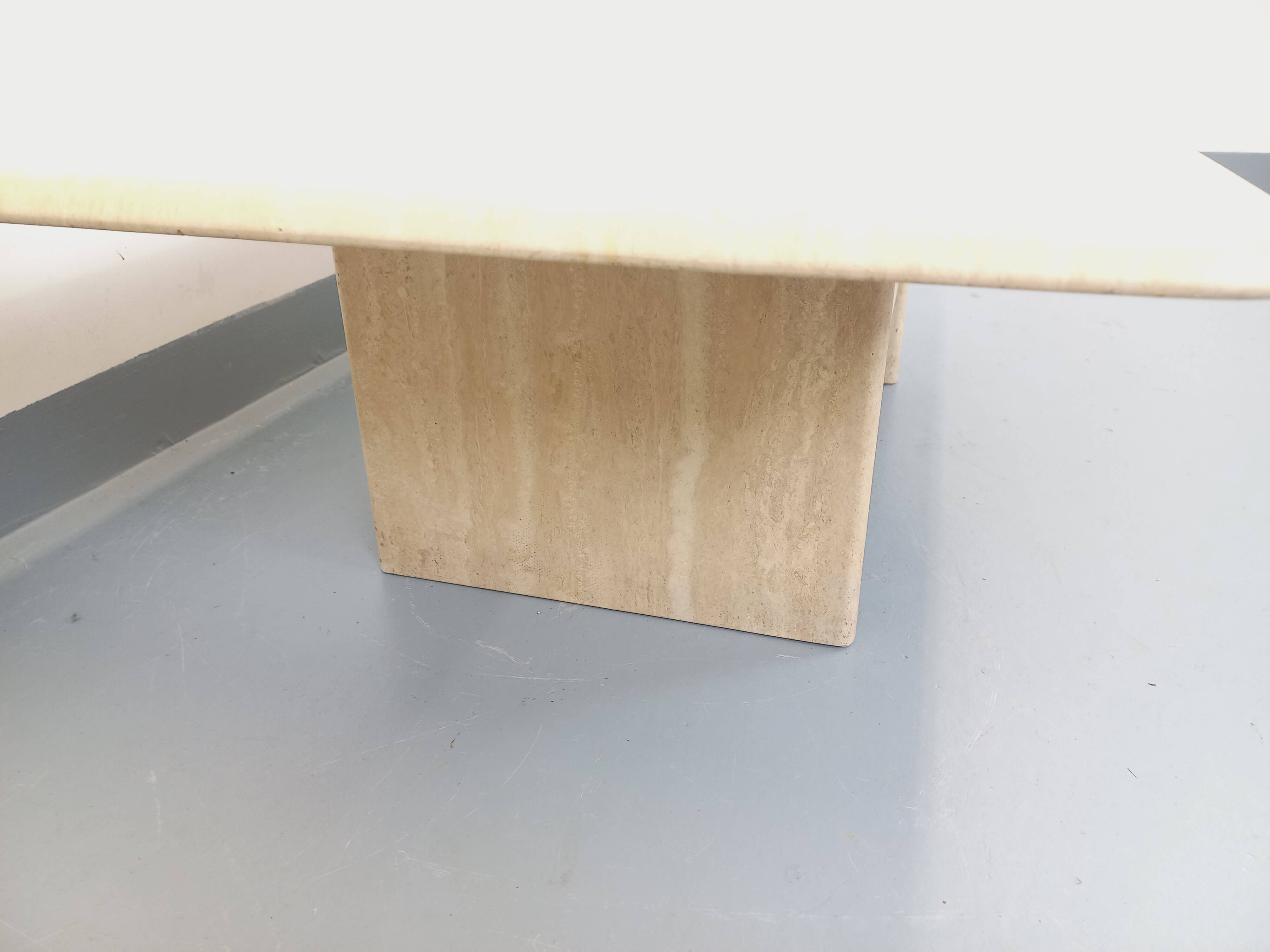 Vintage rectangular coffee table in travertine with magazine rack.
