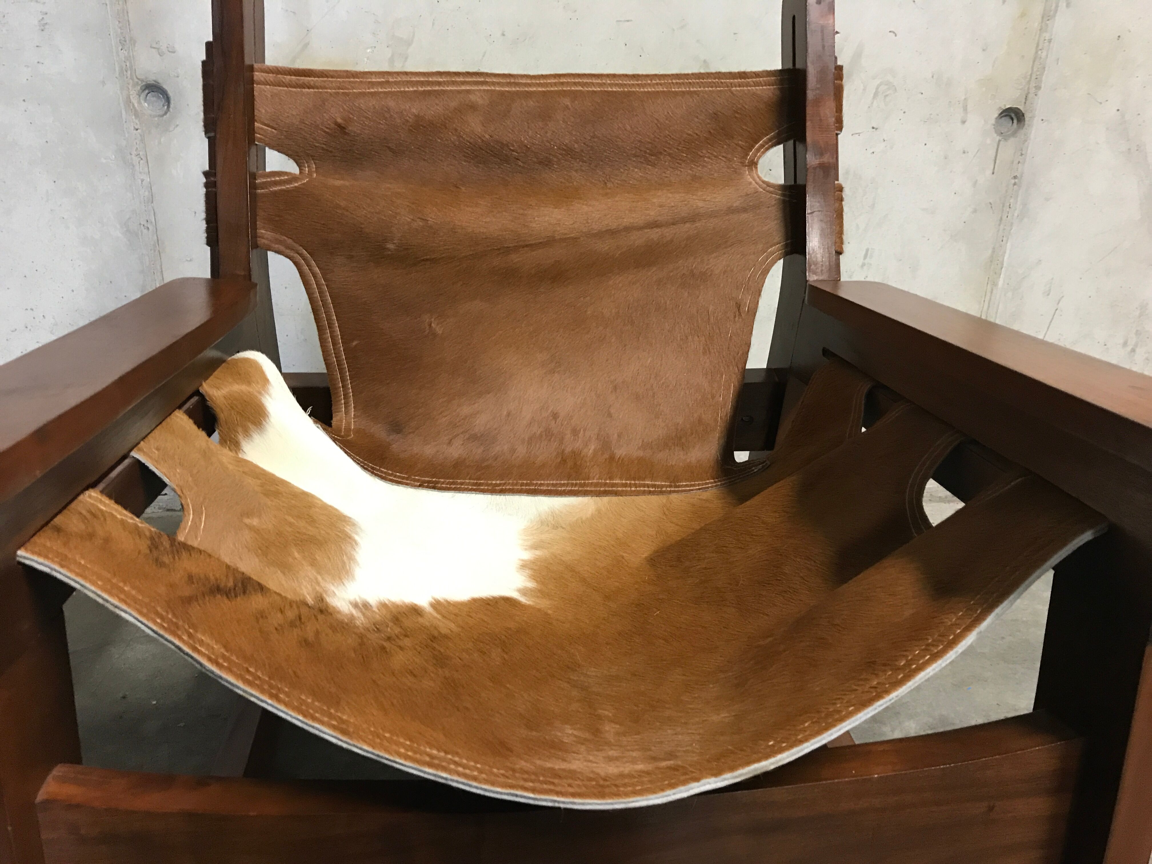 Vintage brazilian cowhide rocking chair, 1950s