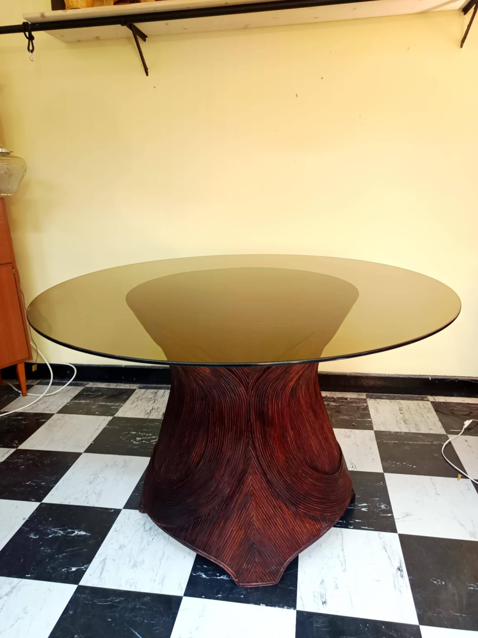 Dining table with rattan marquetry