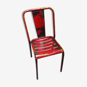 Chair in vintage red metal