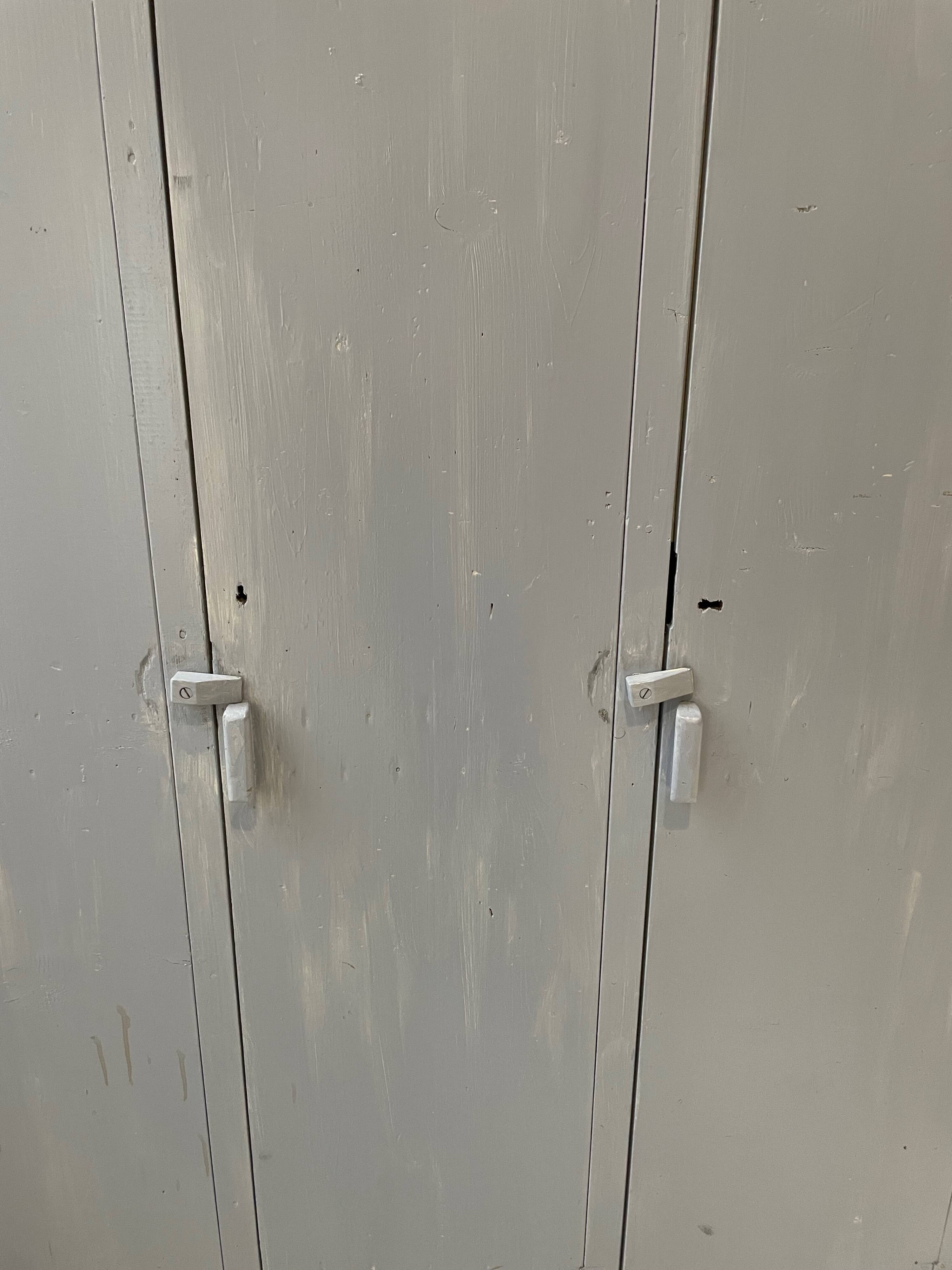 Blue patinated workshop furniture locker room