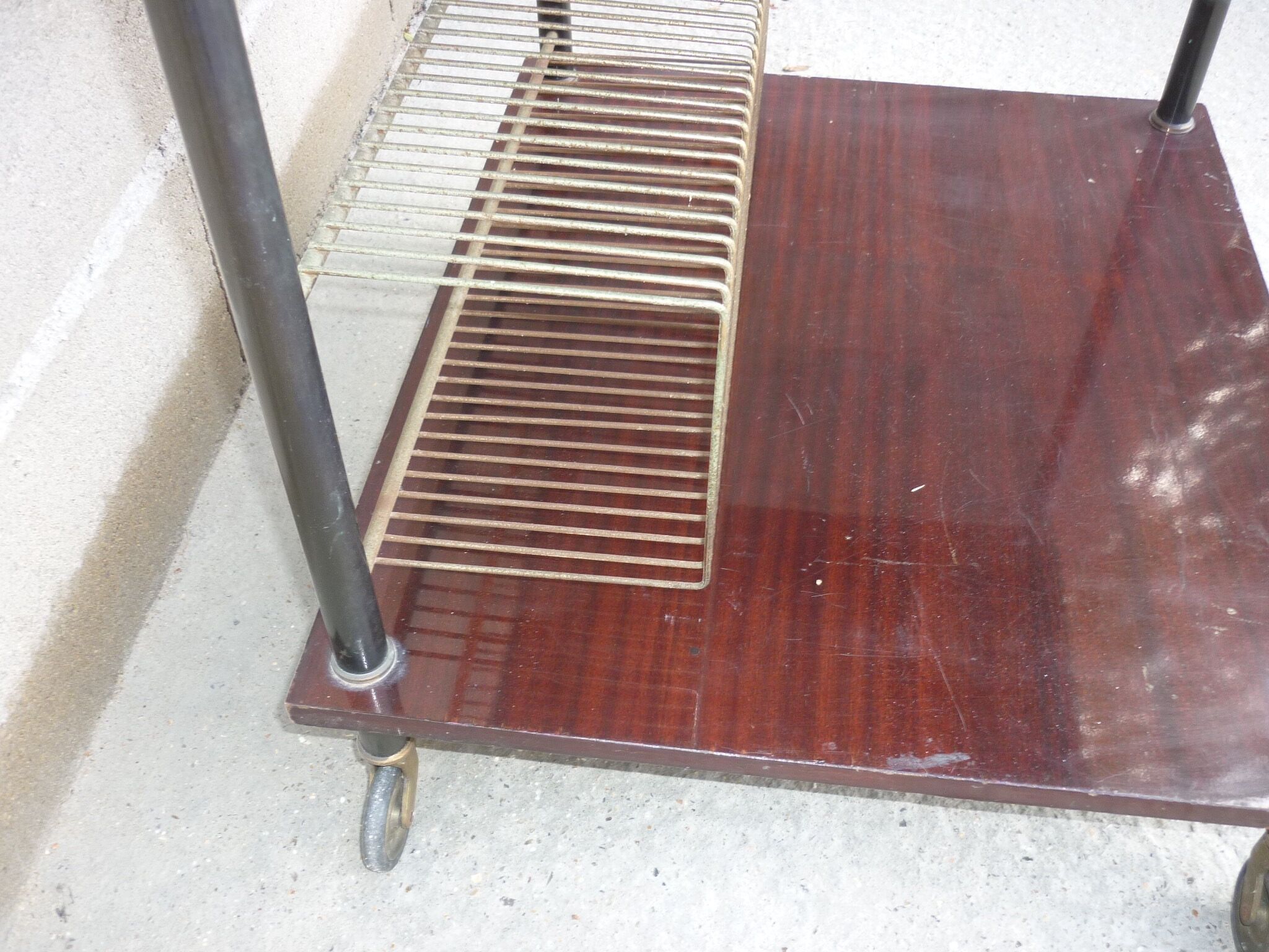 Wooden vintage table on wheels