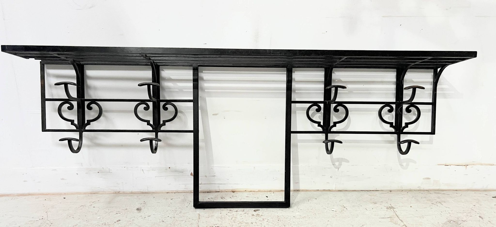 Art Deco wall coat rack in hammered wrought iron, 20th century.