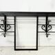 Art Deco wall coat rack in hammered wrought iron, 20th century.