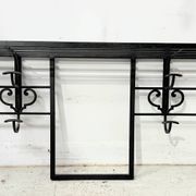 Art Deco wall coat rack in hammered wrought iron, 20th century.