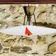 Vintage triangular ceiling light in glass and brass circa 1970s.