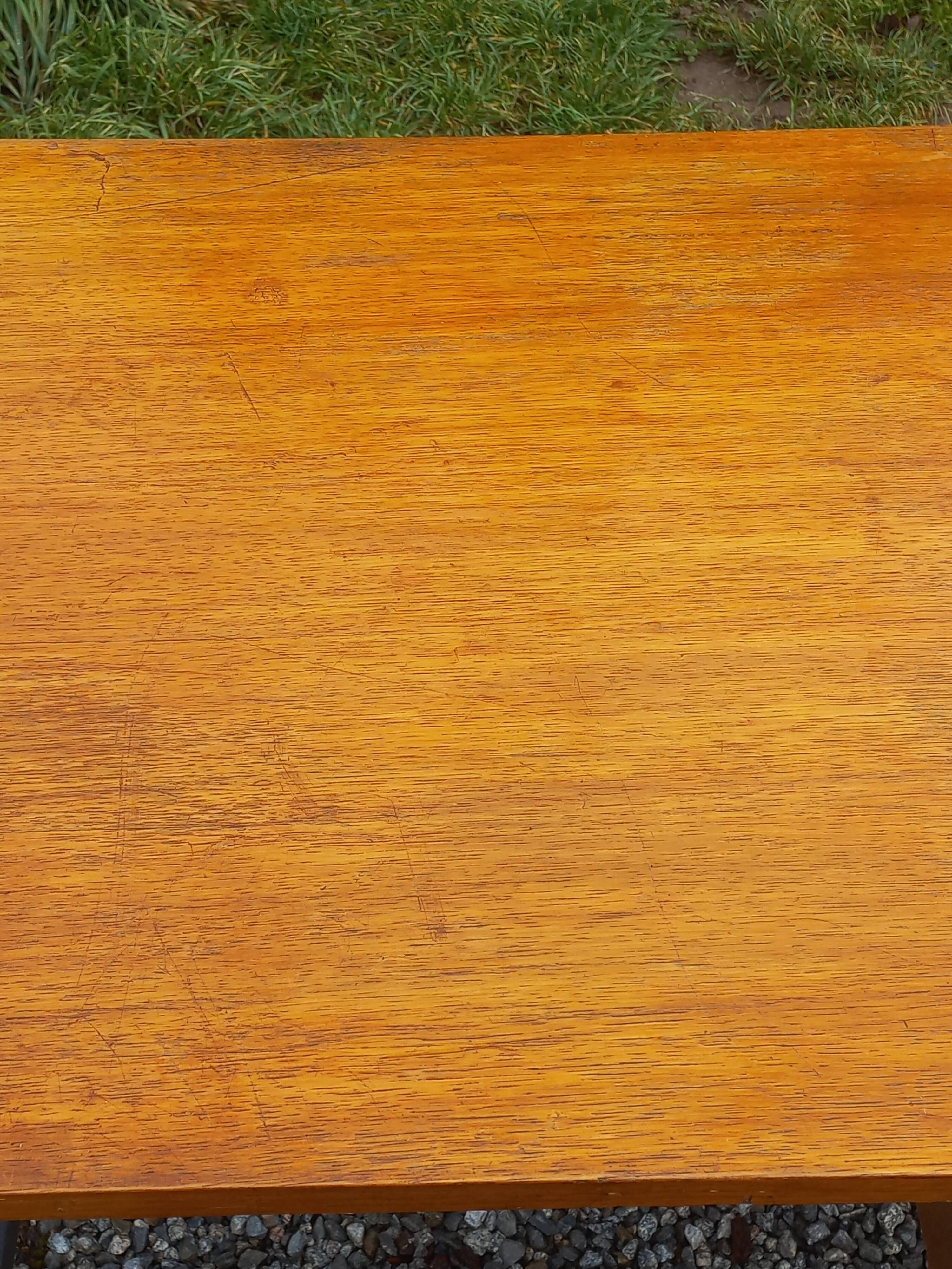 Vintage oak desk with a metallic base from the 1960s.