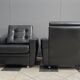 2 Black leather arm chairs 1960s on wheels