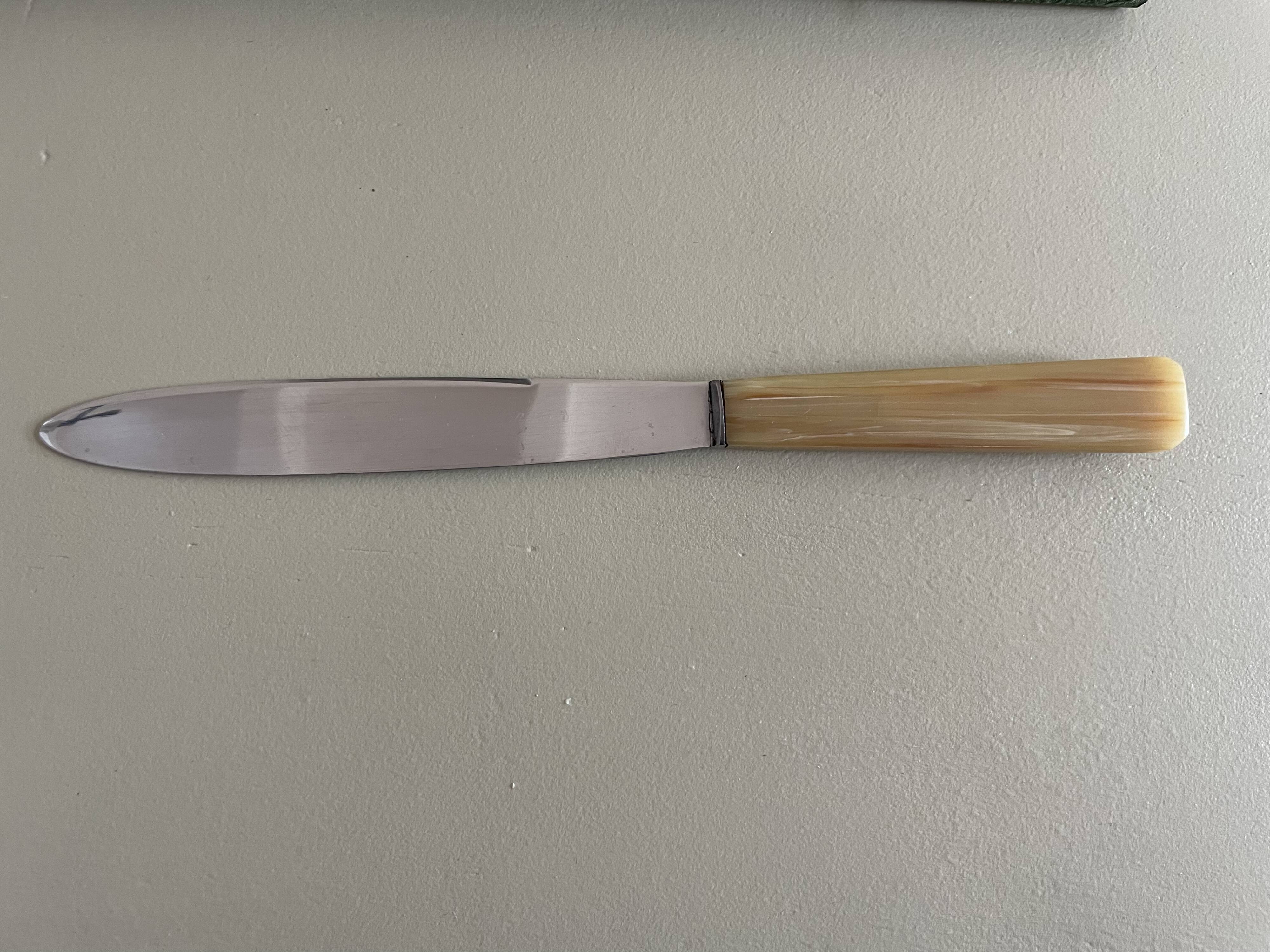 Set of 12 antique knives in green case