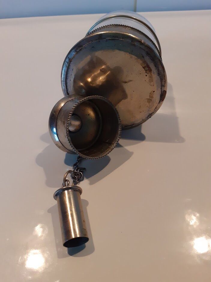 Glass and metal sugar sprinkler