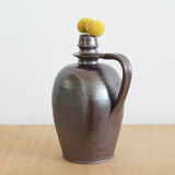 Old Norman bottle in brown ceramic