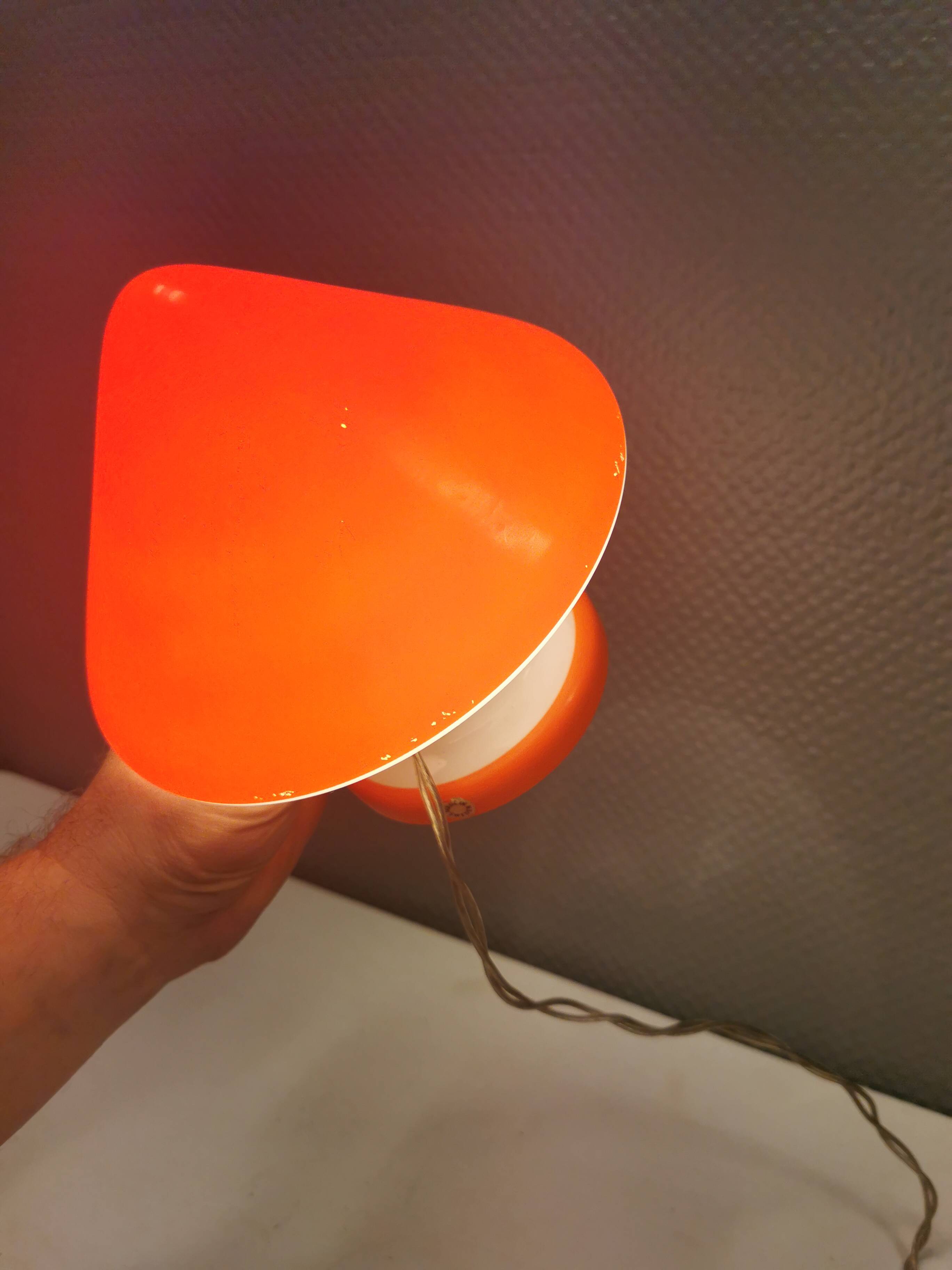 Beautiful Swedish mushroom-shaped table lamps in red and white glass. Estimated 1970s.