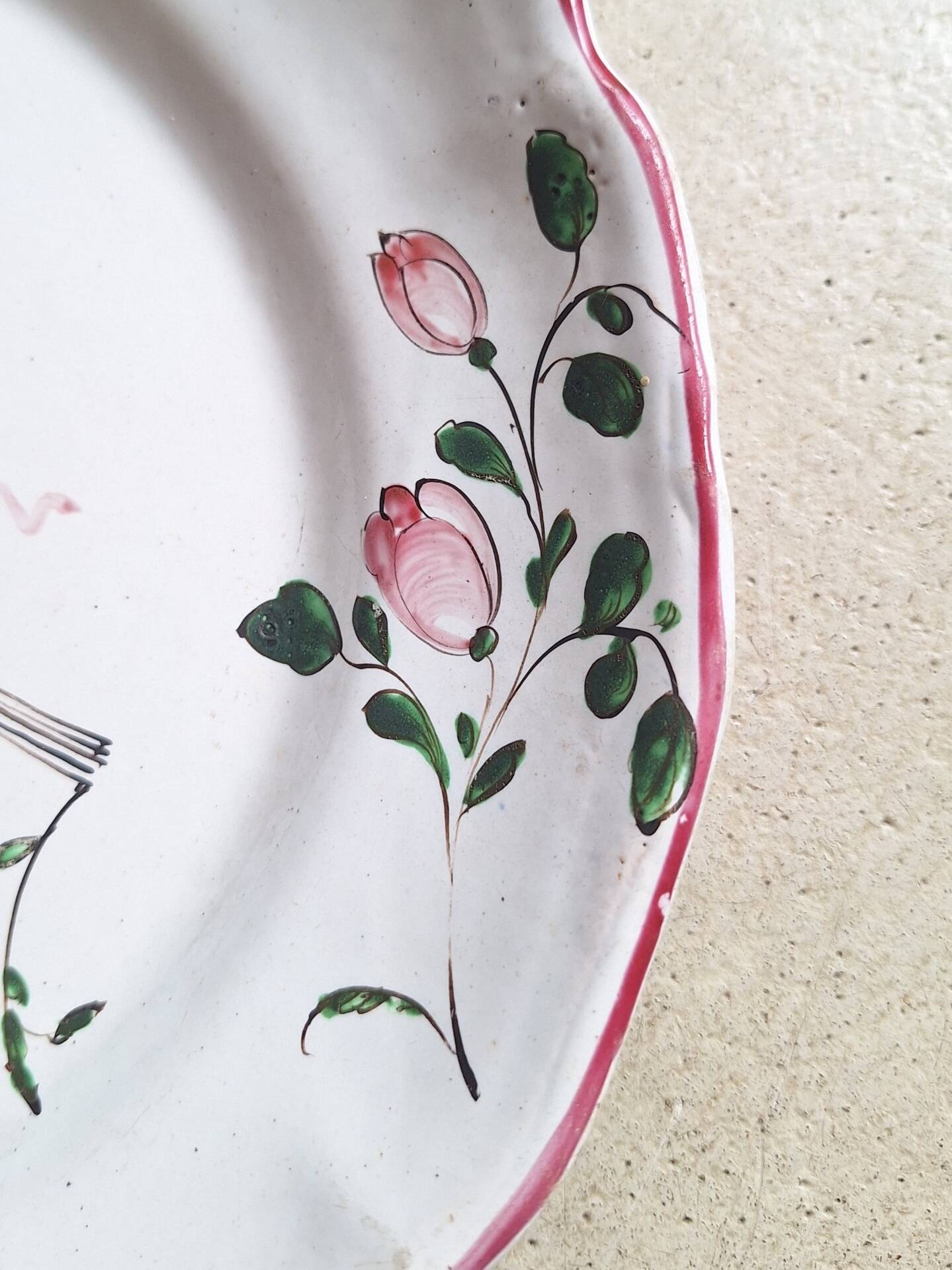Hand-painted earthenware plate from eastern France, 18th century.