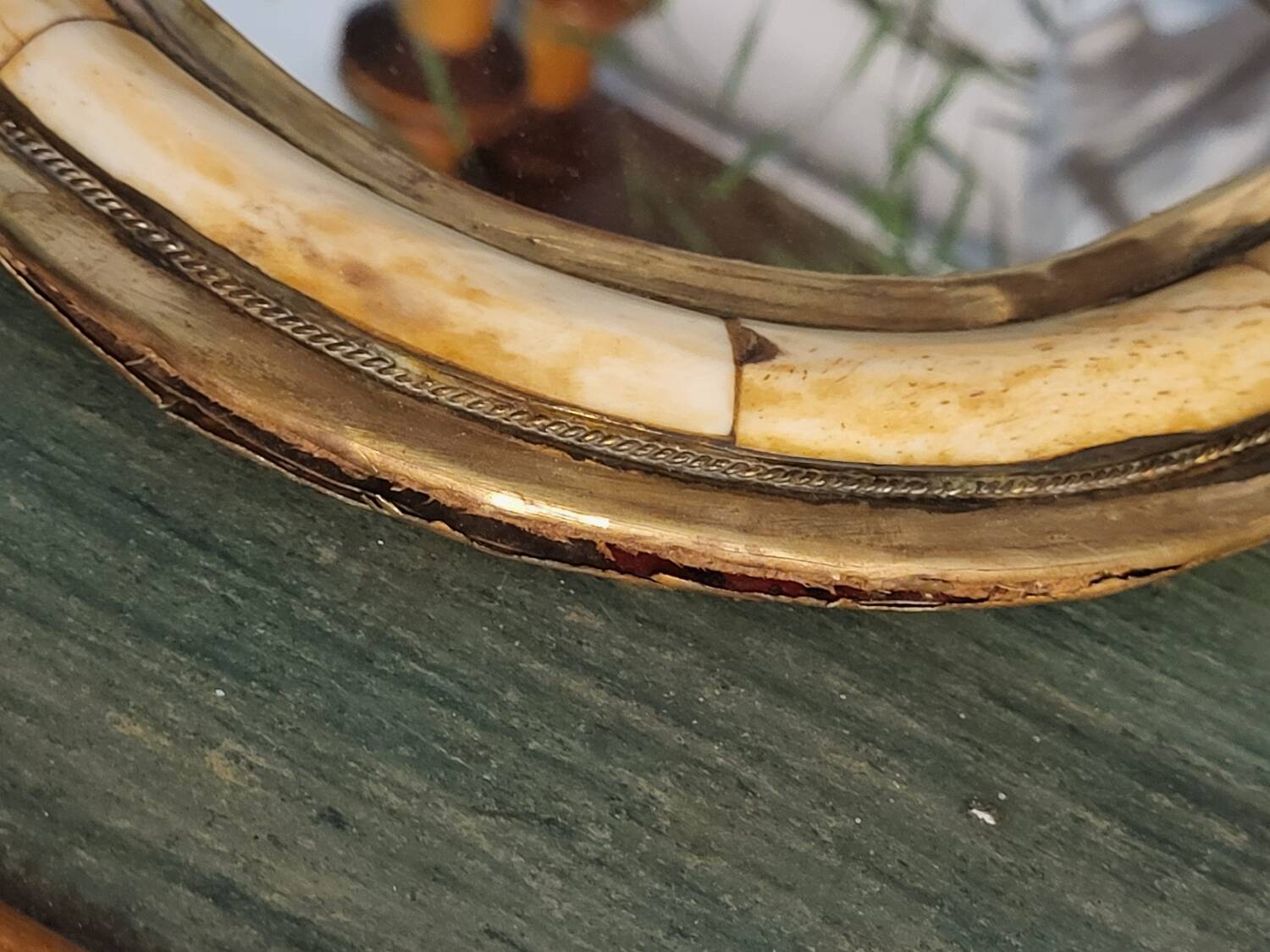 Brass and bone mirror