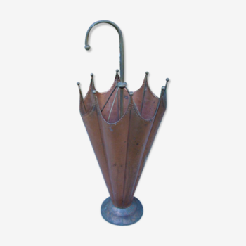 Old copper umbrella holder