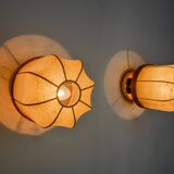 Pair of "cocoon" wall lights, resin and pine, Italy, 1970