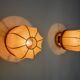 Pair of "cocoon" wall lights, resin and pine, Italy, 1970