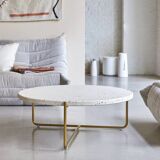 Anatole coffee table in terrazzo and confetti metal by the brand Tikamoon.