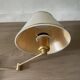 Pair of vintage brass wall lights with adjustable arms.
