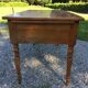 Old farmhouse table louis Philippe style in solid cherry with turned feet.