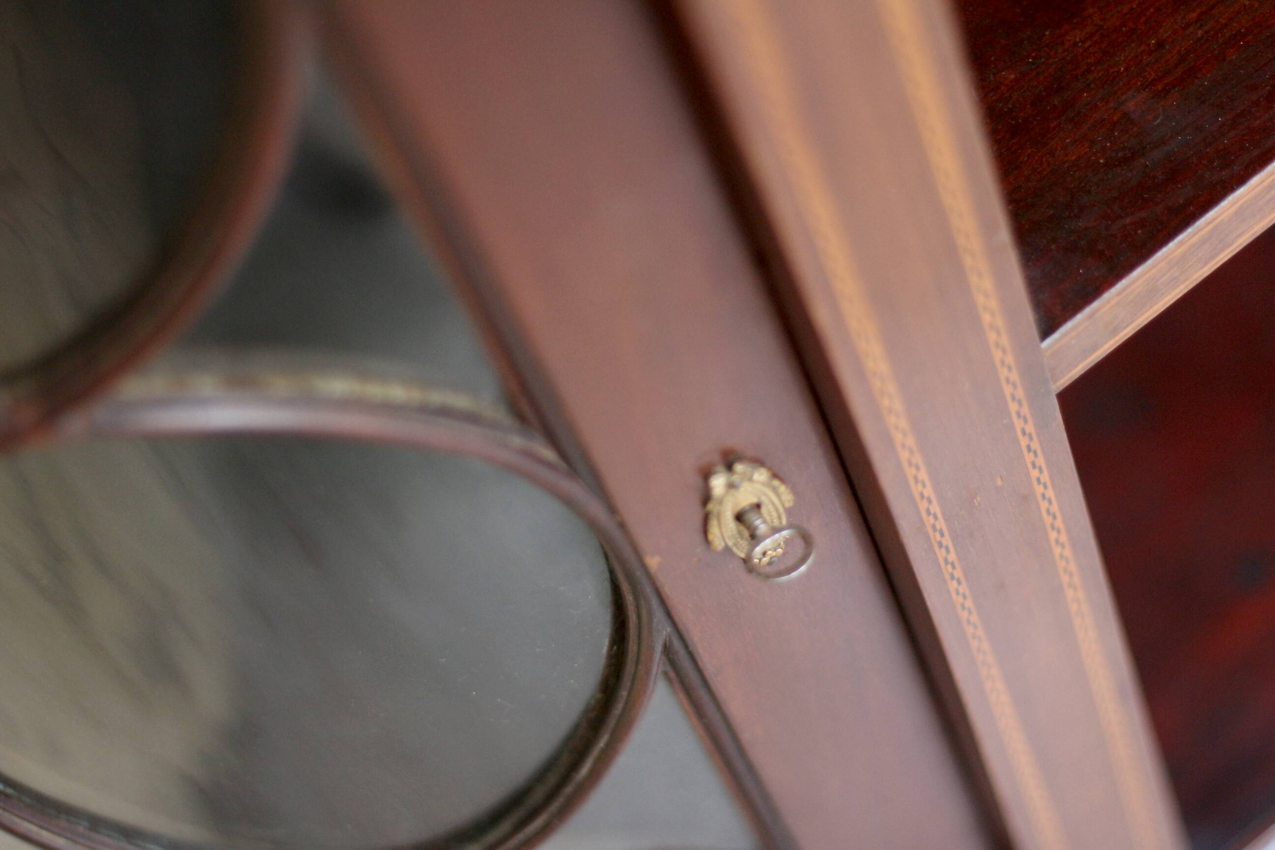 Elegant console by waring & gillow ltd, in mahogany veneer.