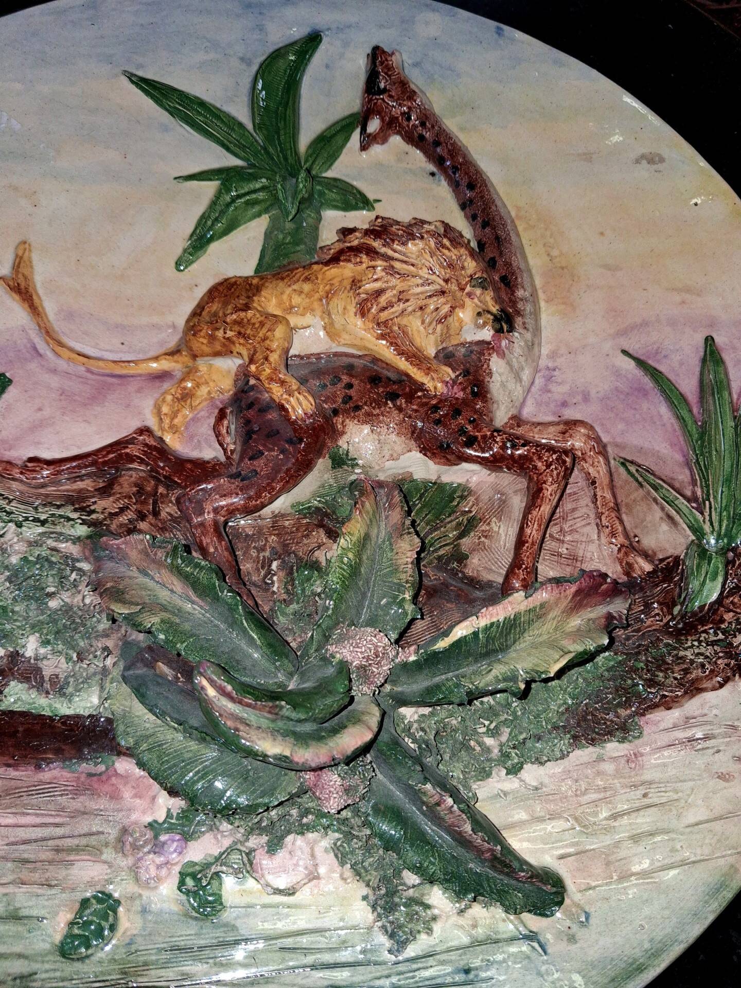 Large wall plate in ceramic with relief decoration