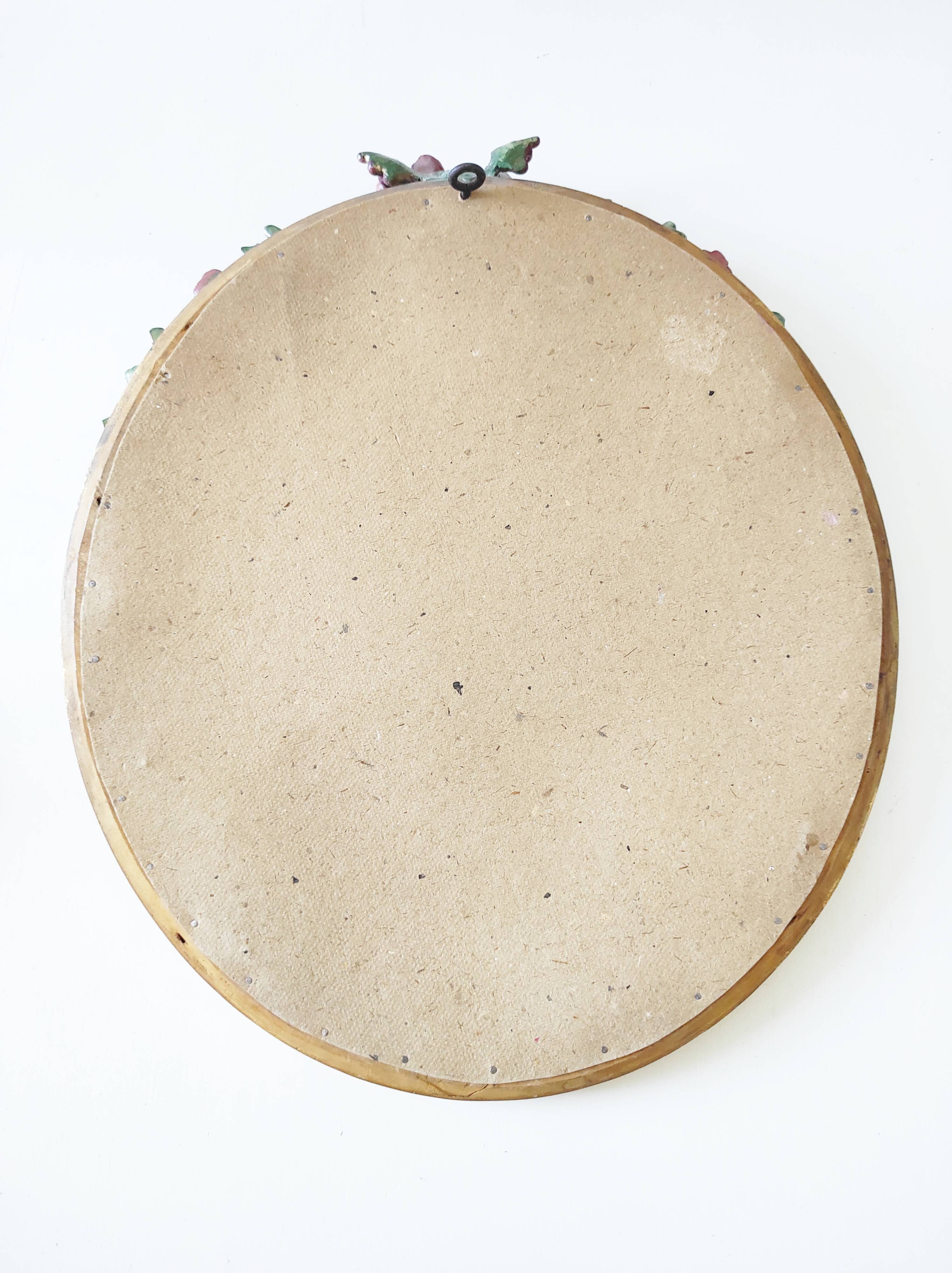 Miroir en bois doré avec fleurs
