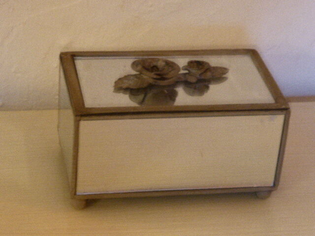 Jewelry box in mirror and metal