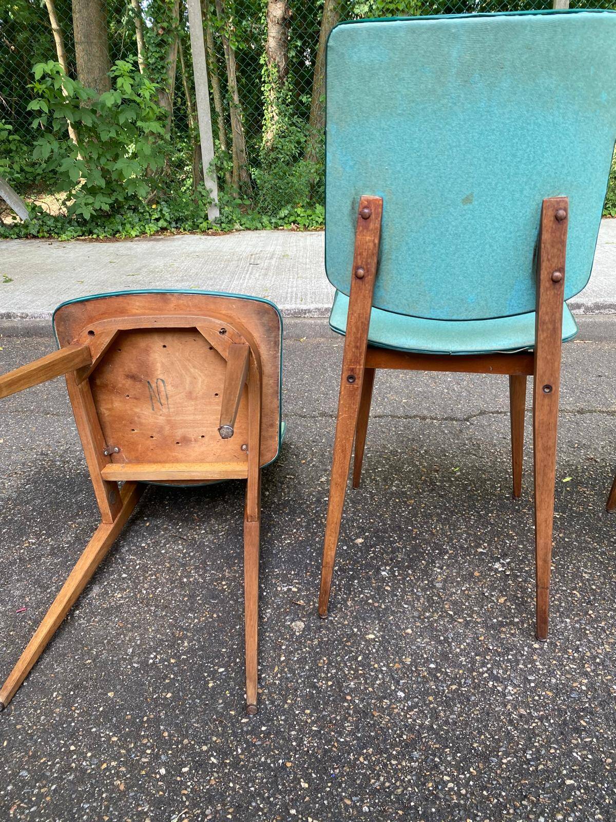 4 Scandinavian dining chairs in solid wood and blue-green leather from the 1950s.