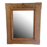 Antique mirror with knot in light oak