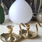 Pair of hand candle holders/Cellar rats shape swans, in polished brass. 1950s