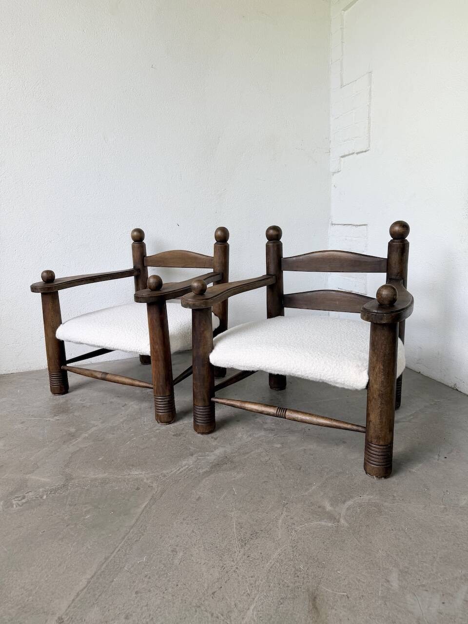 Pair of Dudouyt armchairs from the 1950s, oak.