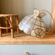 Suspension nacre et laiton