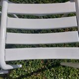pair of white metal chairs, Tolix style
